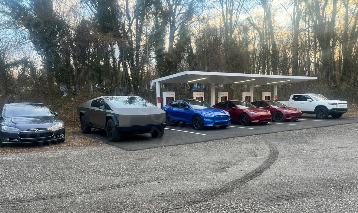 Tesla Supercharger station at dusk